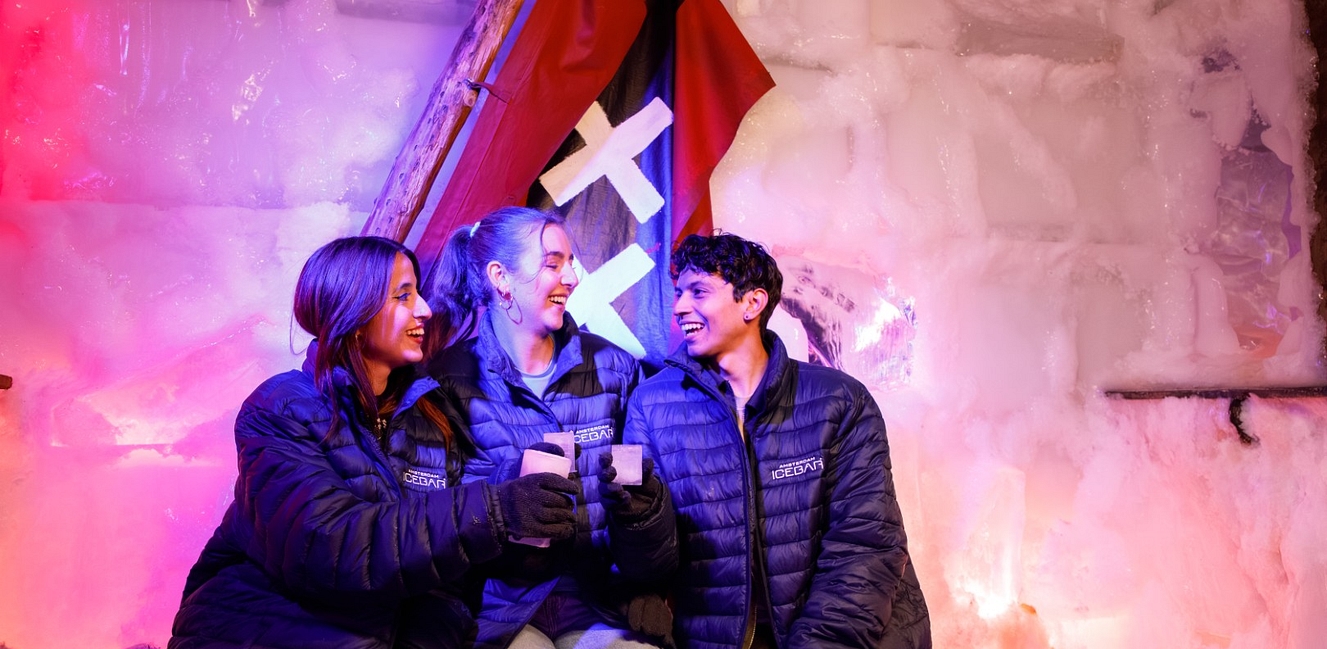 Cheers in Icebar with Amsterdam flag