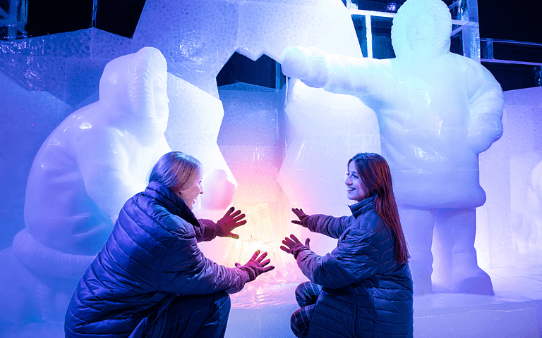 Berlin Icebar Girls Touching an Ice Sculpture 768x480